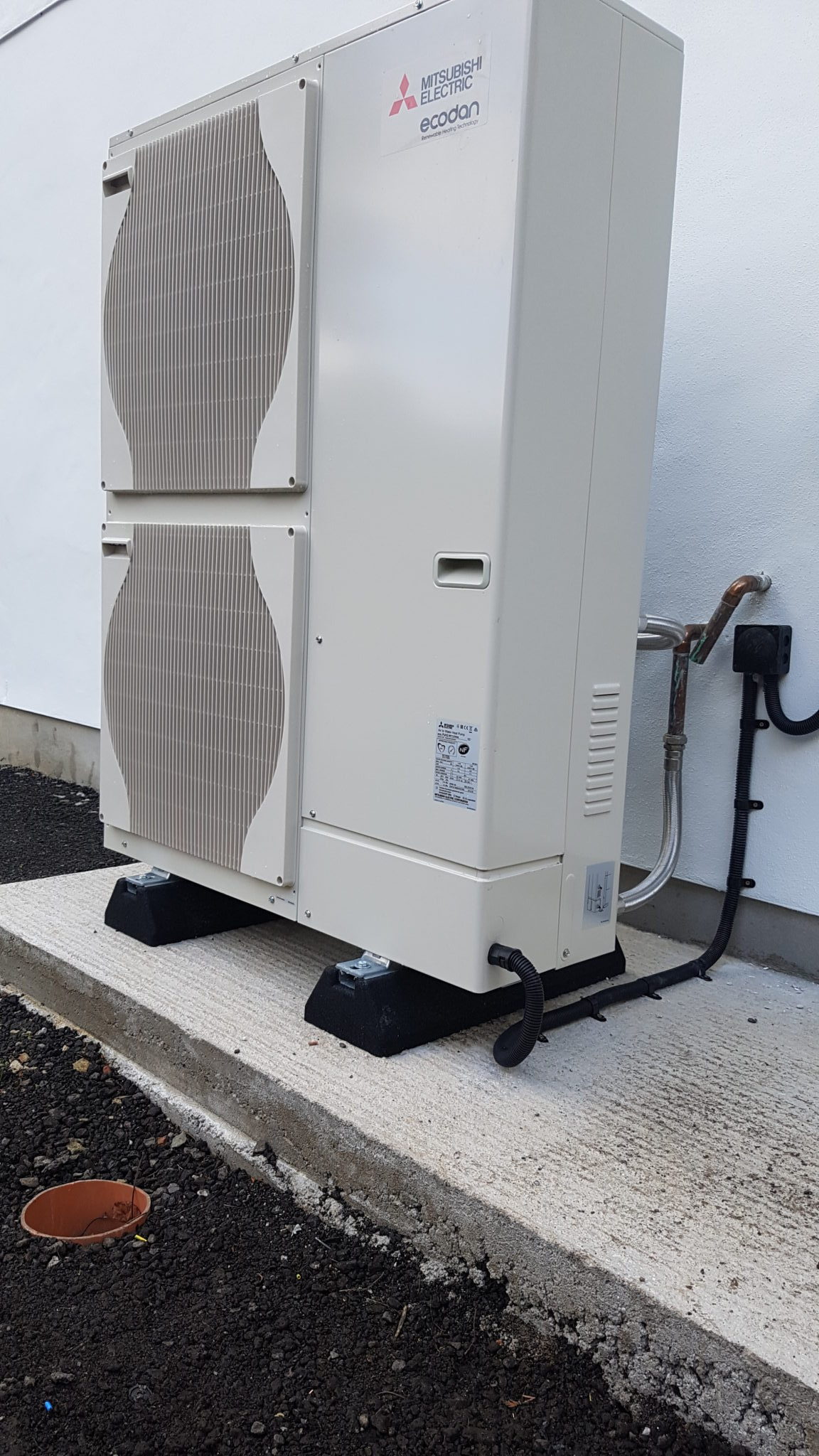 An 11.2kW air source heat pump unit installed in Lanner, Redruth.