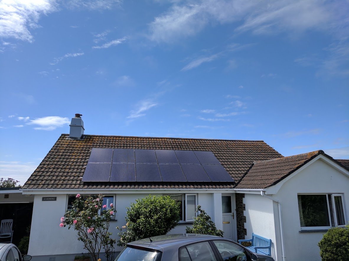 Solar panels installed on a concrete tile bungalow as part of a 3.3kW solar PV installation in Mullion