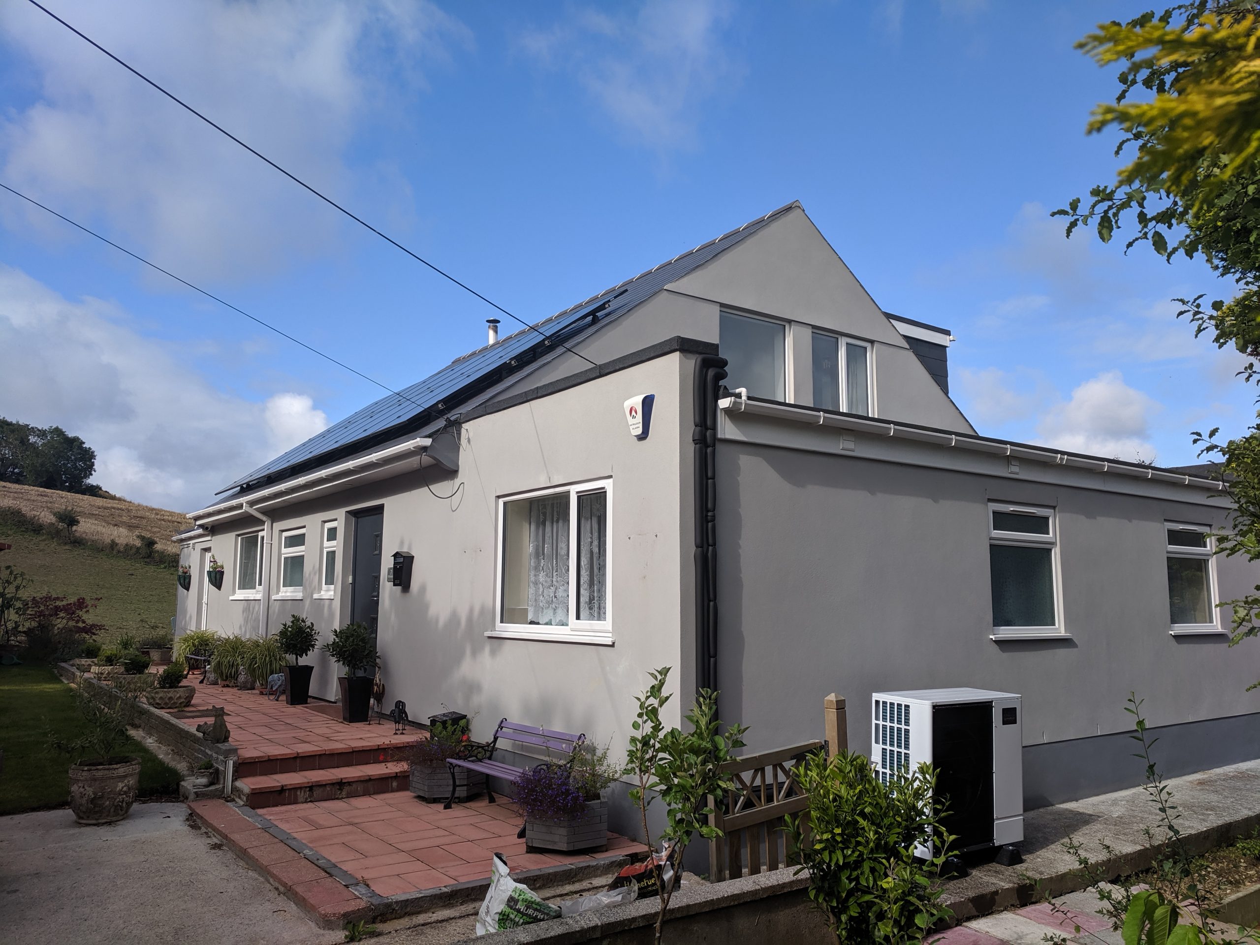 An 8.5kW Ultra Quiet Mitsubishi Ecodan air source heat pump installation.